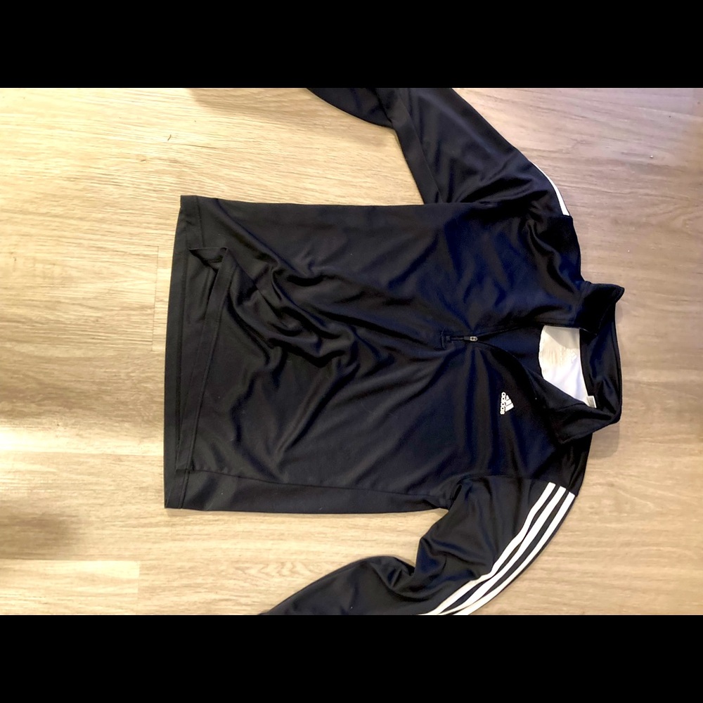 Classic Adidas track suit with the 3 piece on the sleeves.